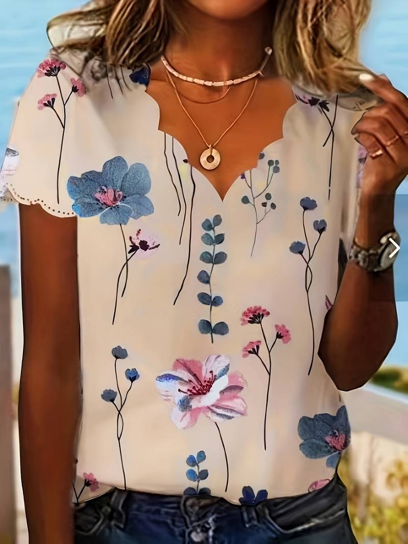 Alyana – Blusa Acampanada con Estampado Floral
