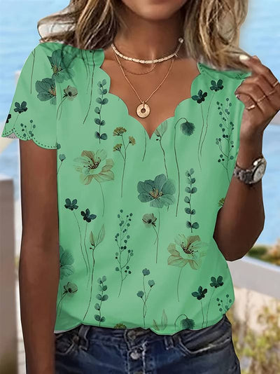 Alyana – Blusa Acampanada con Estampado Floral