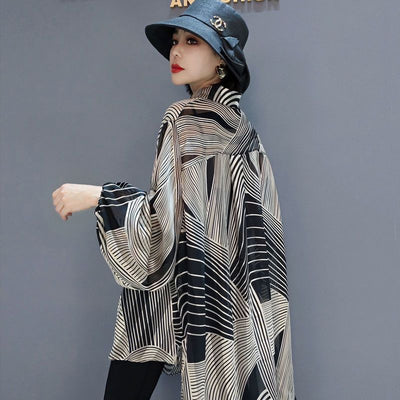 Hazel - Elegante blusa de gasa con corte asimétrico para mujeres
