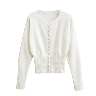 Reverie - Elegante top de punto corto para mujer