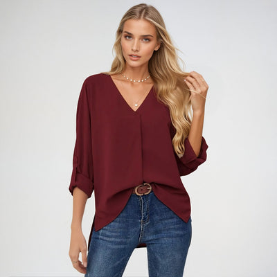 Lena Elegante blusa con cuello en V