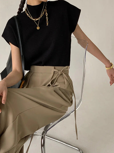 Marika - Elegante top sin mangas
