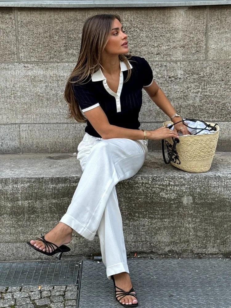 Laura - Elegante polo de punto con cuello en slim fit