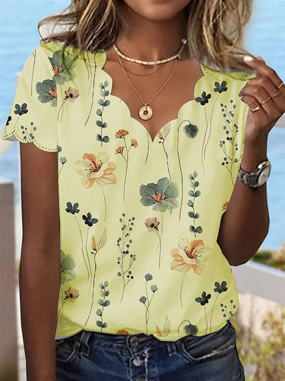 Alyana – Blusa Acampanada con Estampado Floral